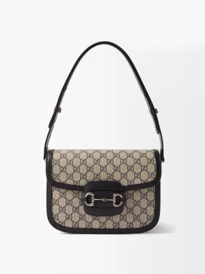 Canvas shoulder bag with black leather trimming