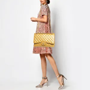 CHANEL Cream Quilted Patent Leather Maxi Classic Single Flap Bag